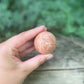Sphère Pierre de lune orange - 110g
